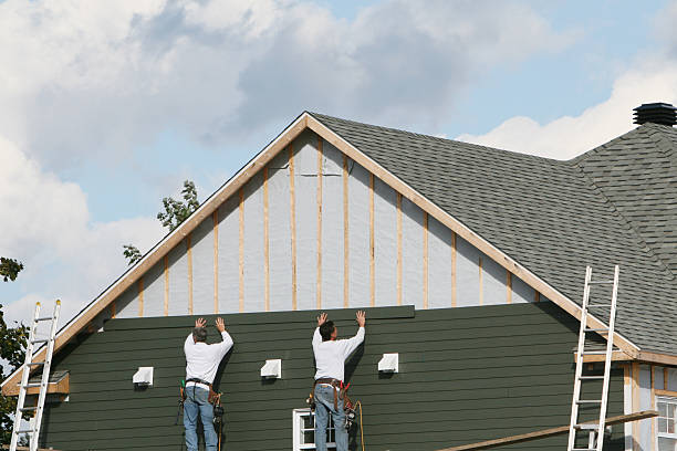 Professional Emergency Siding Repair technician working in Northfield, OH